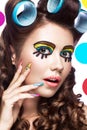 Photo of surprised young woman with professional comic pop art make-up and design manicure. Creative beauty style. Royalty Free Stock Photo