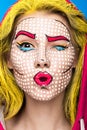 Photo of surprised young woman with professional comic pop art make-up and design manicure. Creative beauty style.