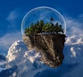 Photo surrealism showing a floating island on a rock enclosed by a glass dome