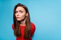 Photo of suspicious lady look distrustful on camera wear red knitted sweater isolated blue color background