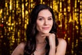 Photo of sweet pretty young woman dressed black outfit arm chin smiling gold shine backdrop background