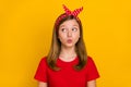 Photo of sweet teen girl blow kiss empty space wear red t-shirt headband isolated on yellow color background Royalty Free Stock Photo