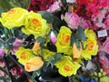 A closeup of an some yellow artificial flowers