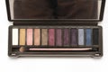 A dark brown eye shadow cosmetic palette kit