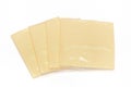 A few slices of single wrapped processed cheese Royalty Free Stock Photo