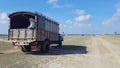 A lorry moving in the sunny environment