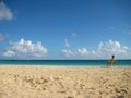 Woman resting on a beach chair on Caribbean beach