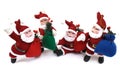 Santa Claus Father Christmas Figurines closeup on display white backdrop