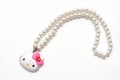 A Hello Kitty plastic toy pearl necklace