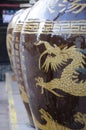 Huge big large oriental clay pot vase with a dragon carving