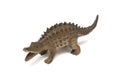 A low back long jaw dinosaur toy figurine