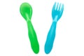 A luminous plastic blue fork and a green spoon