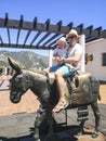 Father and son on the donkey,mijas Royalty Free Stock Photo