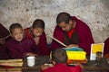 Bhutanese novice monk attempt recite the text and pass the exam , Bhutan