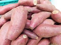 A bunch of purple sweet potatoes on display for sale Royalty Free Stock Photo