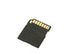 The reverse face side of a black regular secure digital memory card against a white backdrop
