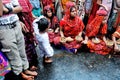 Mother and child at dhuni ritual at west bengal india Royalty Free Stock Photo