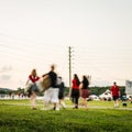 Group of People Walking to an Outdoor Concert And Fireworks Show