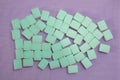 Top down view of the reverse down side of a set of green turquoise Mah Jong game tiles