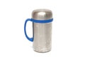 A well used vacuum flask with handle