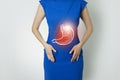 Photo template of unrecognizable woman representing graphic visualisation of stomach organ highlighted red.