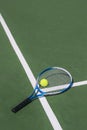 Photo of tennis racket tennis ball on court background. Royalty Free Stock Photo