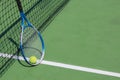 Photo of tennis racket tennis ball on court background. Royalty Free Stock Photo