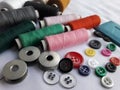 Tailoring matirial thread spools, tailor chalk, buttons