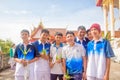 Thai students wear white clothes making a merit at the temple in Pranburi, Thailand July 21,2017