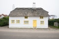 Thatched Cottage English Village House. Royalty Free Stock Photo