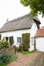 Thatched Cottage English Village House. Royalty Free Stock Photo