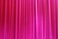 Photo Theatrical curtain of crimson color of velvet.