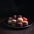 Multicolored layered cookies on a table in close-up.