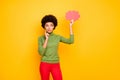 Photo of thinking pondering interested woman in red pants looking into pink cloud of thoughts thinking on new ideas