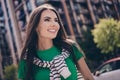 Photo of thoughtful creative young lady wear green t shirt looking clear sky inspiration big city life on residential Royalty Free Stock Photo