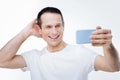 Joyful nice man posing for selfie