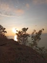 photo from the top of the mountain and the view of the sun setting in the afternoon Royalty Free Stock Photo