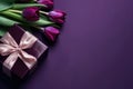 Photo Of The Top View Of The Copy Space And The Luxurious Purple Gift Box With Ribbon Bow On The Side And Bouquet Of Silver Tulips