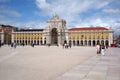 Town Square and Yellow Building in Lisbon Portugal Europe with Tourists