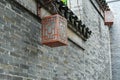 traditional Chinese style lantern hanging on old brick wall Royalty Free Stock Photo