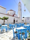 Photo of a traditional Greek tavern outside the Church of Virgin Malamatenia on the Cycladic island of Tinos, Greece. Royalty Free Stock Photo