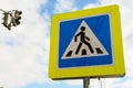 Photo of traffic lights and pedestrian crossing sign in a city. Royalty Free Stock Photo