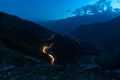 Traffic trails on rohtang pass at night. Crossing mountains in India Royalty Free Stock Photo