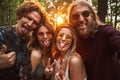 Photo of trendy hippie people men and women, smiling and taking Royalty Free Stock Photo