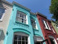 Turquoise and Red Brick Townhouses Royalty Free Stock Photo