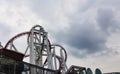 A photo of a twisted roller coaster turns with sky in background Royalty Free Stock Photo