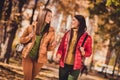 Photo of two beautiful pretty joyful nice glad positive friends having good time together speaking about weather Royalty Free Stock Photo