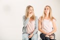 Photo of two beautiful young girls . Beauty portrait of twins sisters