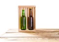 Photo of two different full beer bottles with no labels. Separate clipping path for each bottle included.2 two separate photos