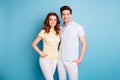 Photo of two pair people lovely look perfect toothy beaming smile hugging each other wear casual t-shirts isolated blue